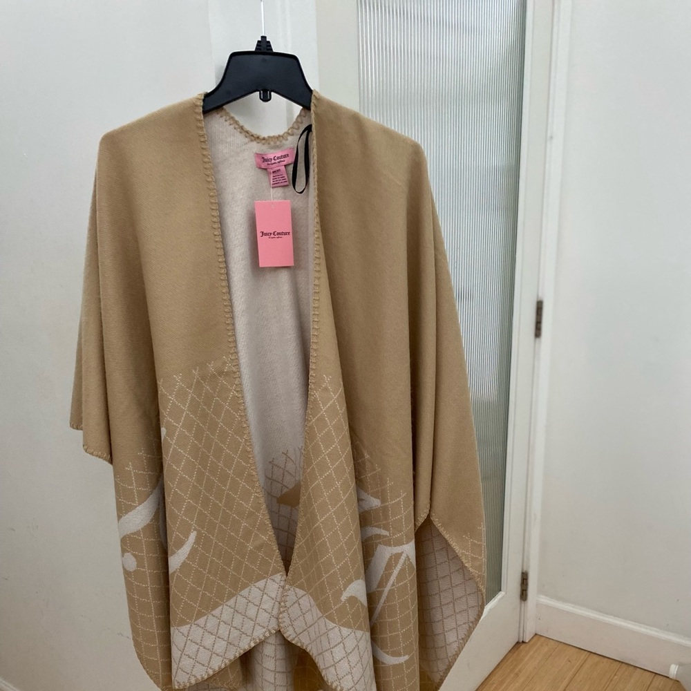 New poncho with one size fits all. Reversible